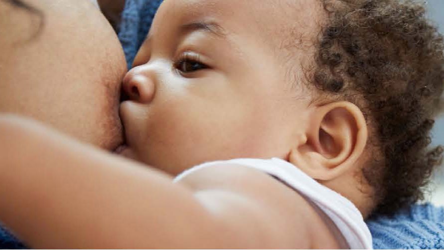 A newborn who is breastfeeding.